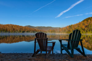 adirondack chairs overlooking lake